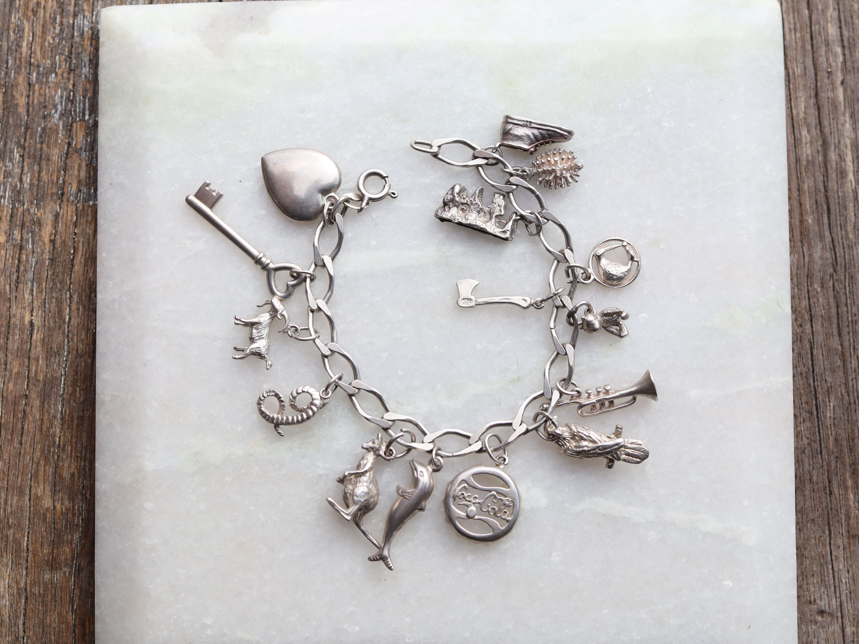 Sterling Silver Charm Bracelet With 15 Charms